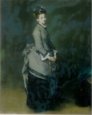 A portrait of a white adult woman wearing a grey dress, looking towards the painter.